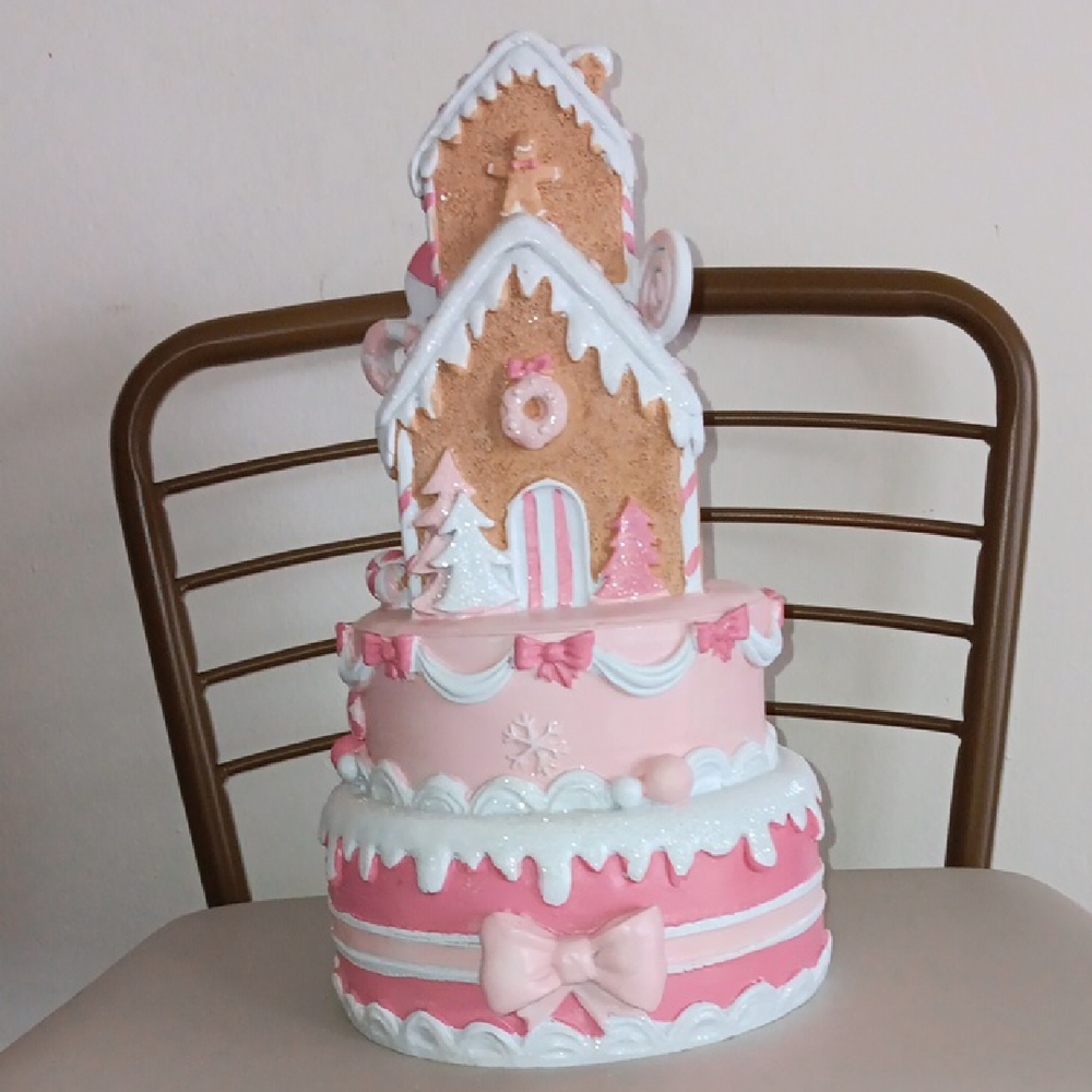 Viral Pink and White Bow Gingerbread House